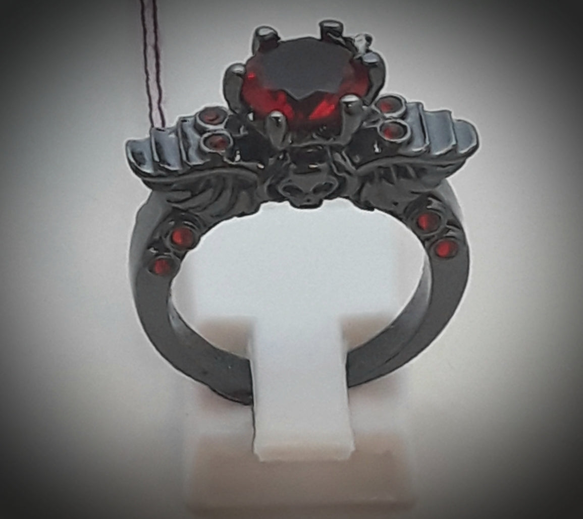 Angel wings and skull ring red gems size 8