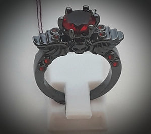 Angel wings and skull ring red gems size 8