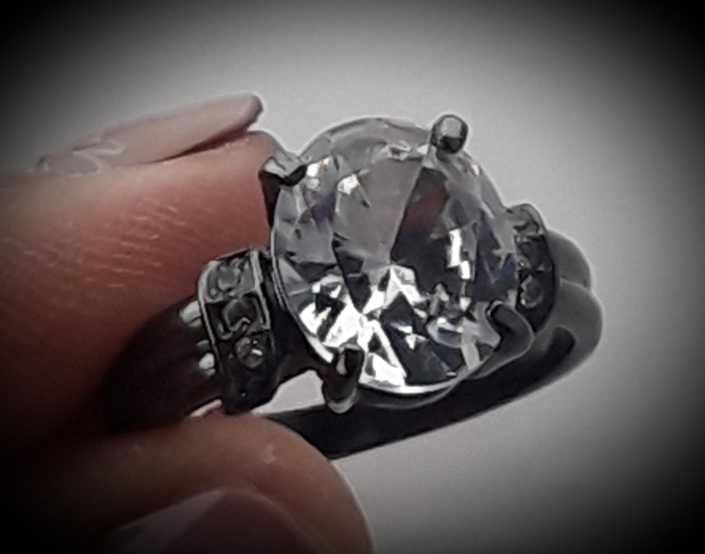 Black metal ring with rhinestones