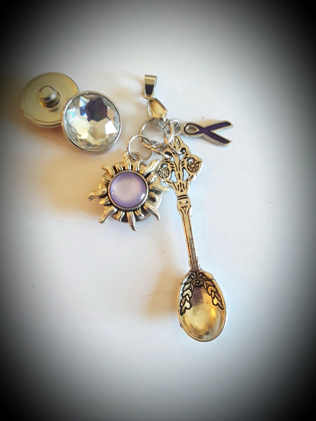 18mm noosa base pendant with spoon, butterfly, and purple awareness ribbon