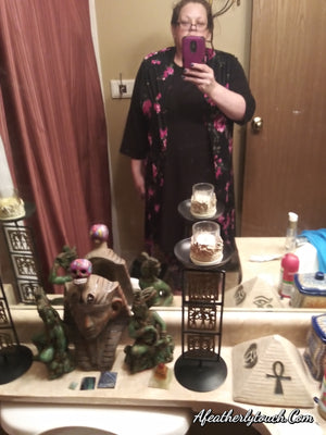 Black dress with pockets and a rose duster
