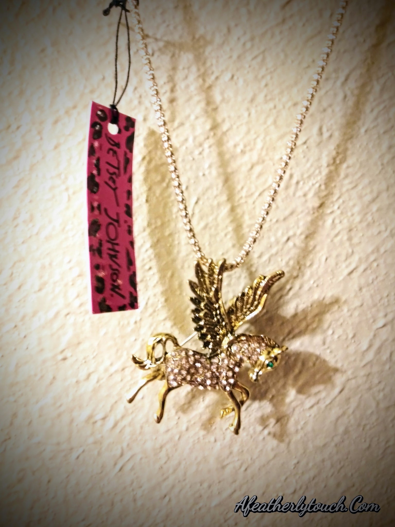 BETSEY JOHNSON GOLD AND CRYSTAL PEGASUS HORSE PENDANT/BROACH