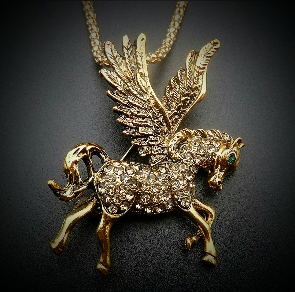 BETSEY JOHNSON GOLD AND CRYSTAL PEGASUS HORSE PENDANT/BROACH