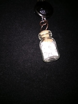 Crystals in a bottle gem necklace with removable snap