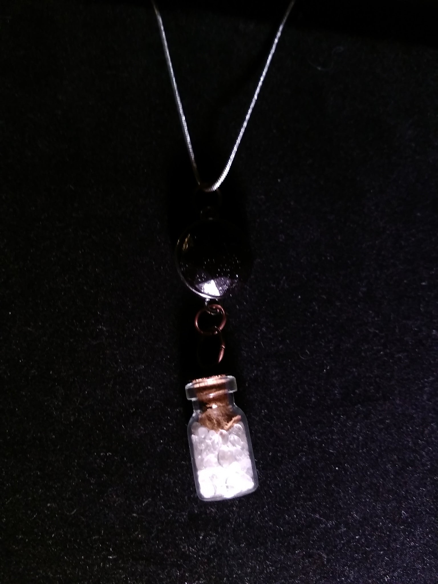 Crystals in a bottle gem necklace with removable snap