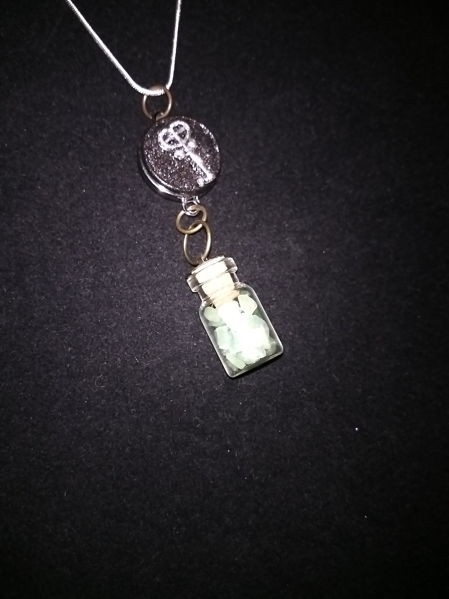 Crystals in a bottle gem necklace with removable snap