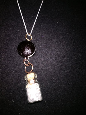 Crystals in a bottle gem necklace with removable snap